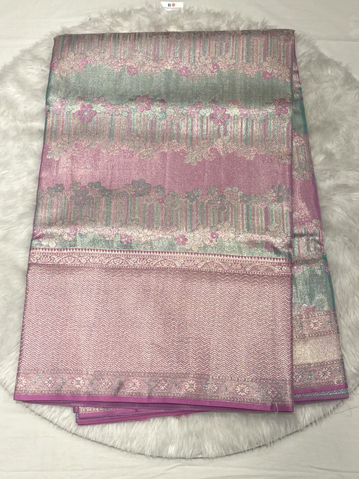 Luminous Dual-Tone Kanjivaram Pattu Saree featuring horizontal stripes (Padi/Patta) in shimmering Fuchsia Pink and Seafoam Green with floral motifs, finished with a broad, tone-on-tone Pink Brocade border.