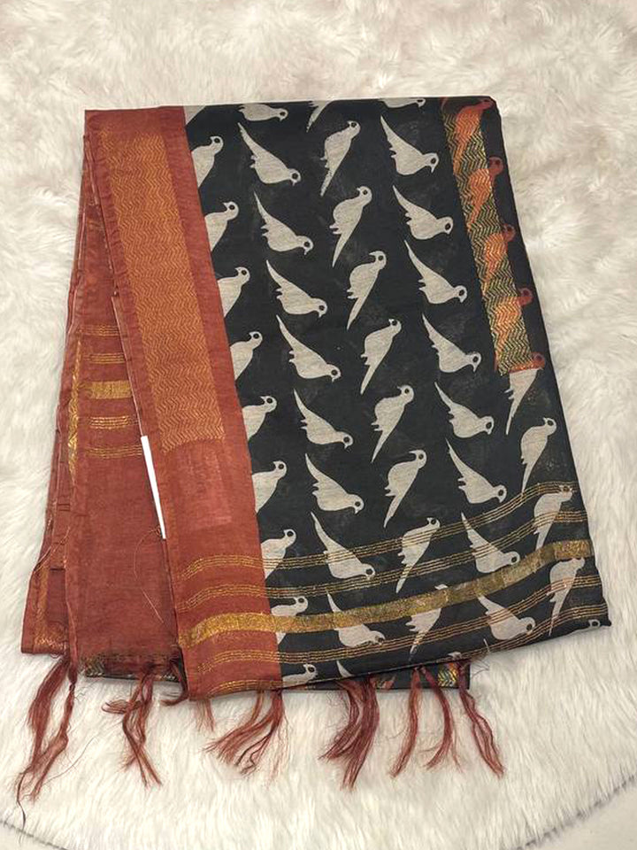 Black Bailu Cotton Saree with bird motifs, terracotta rust contrast pallu, and gold stripes