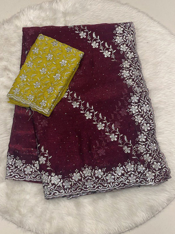 Deep Maroon Chiffon Saree with Heavy Silver Zari Floral Cutwork Border and Vibrant Contrast Designer Blouse.