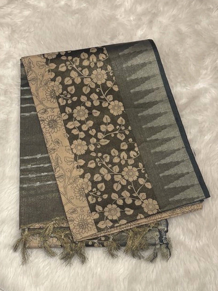 Dark grey jute silk saree featuring silver tissue temple border and intricate floral peacock prints