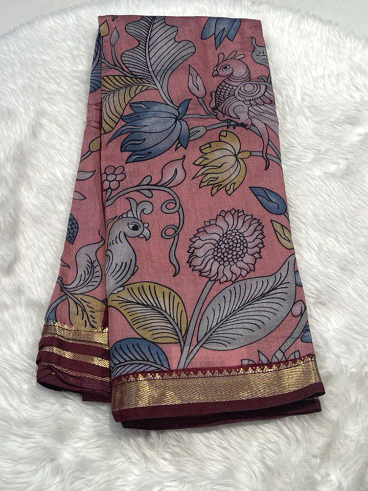 Onion Pink Maheshwari silk cotton saree featuring floral kalamkari art and gold border.