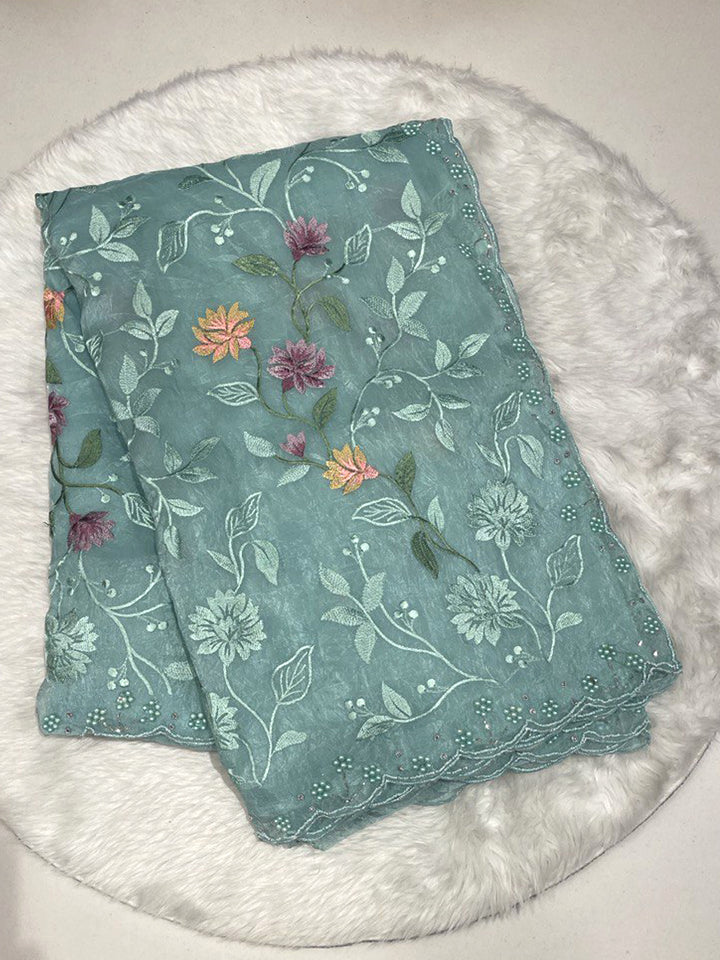 Space Silk Saree in Sea Green with Full Thread Work Floral Vine Embroidery and Moti Cut-Work Border.