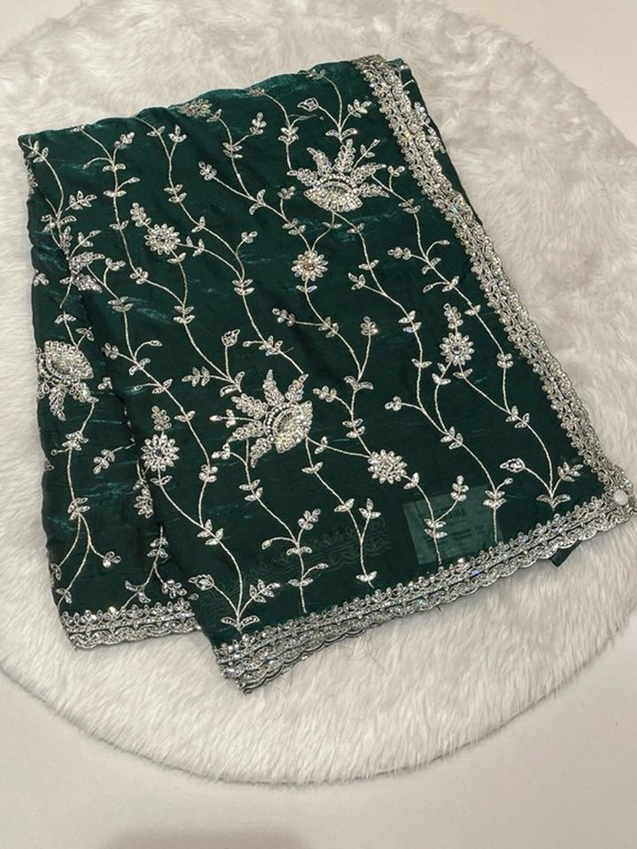 Bottle Green Space Silk Saree featuring all-over silver antique work and designer cutwork border