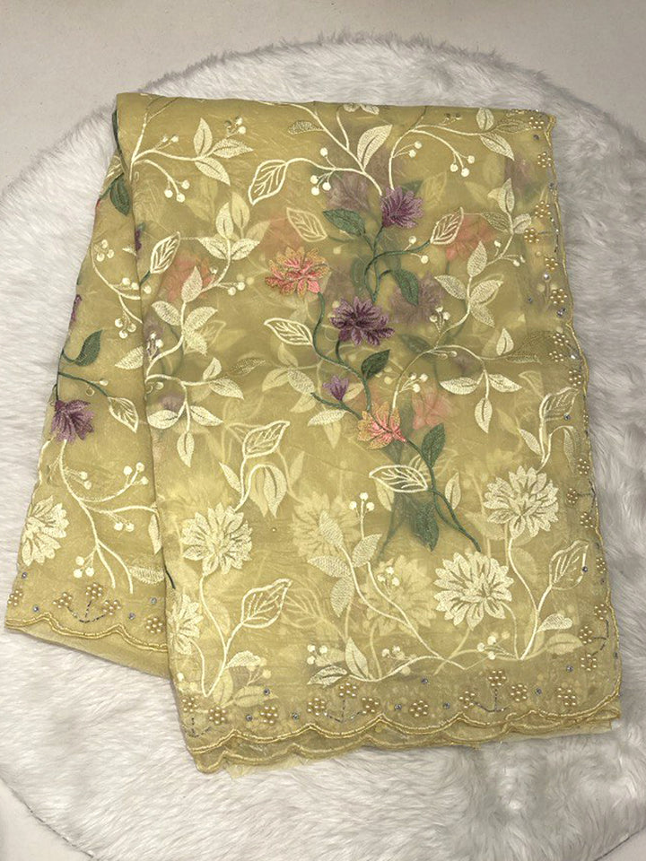 Space Silk Saree in yellow with Full Thread Work Floral Vine Embroidery and Moti Cut-Work Border.